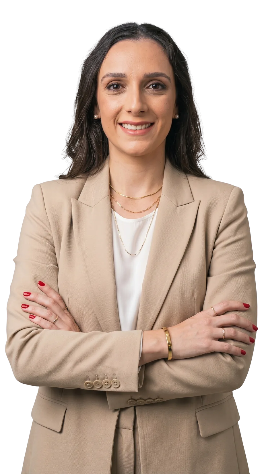 Carolina Tiseo, psicóloga, de braços cruzados e blazer bege