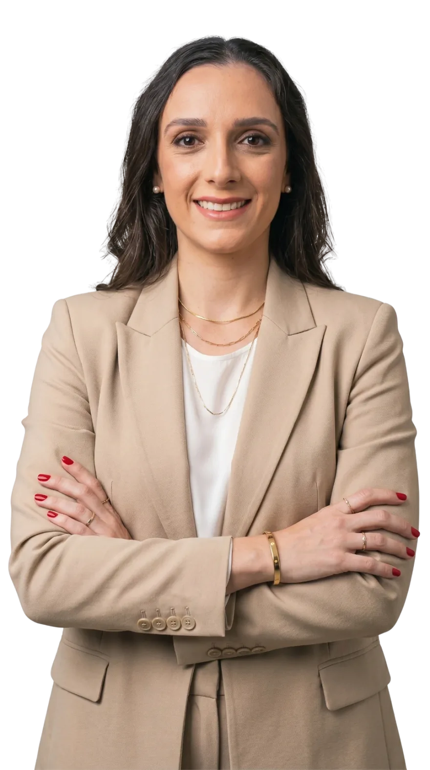 Carolina Tiseo, psicóloga, de braços cruzados e blazer bege
